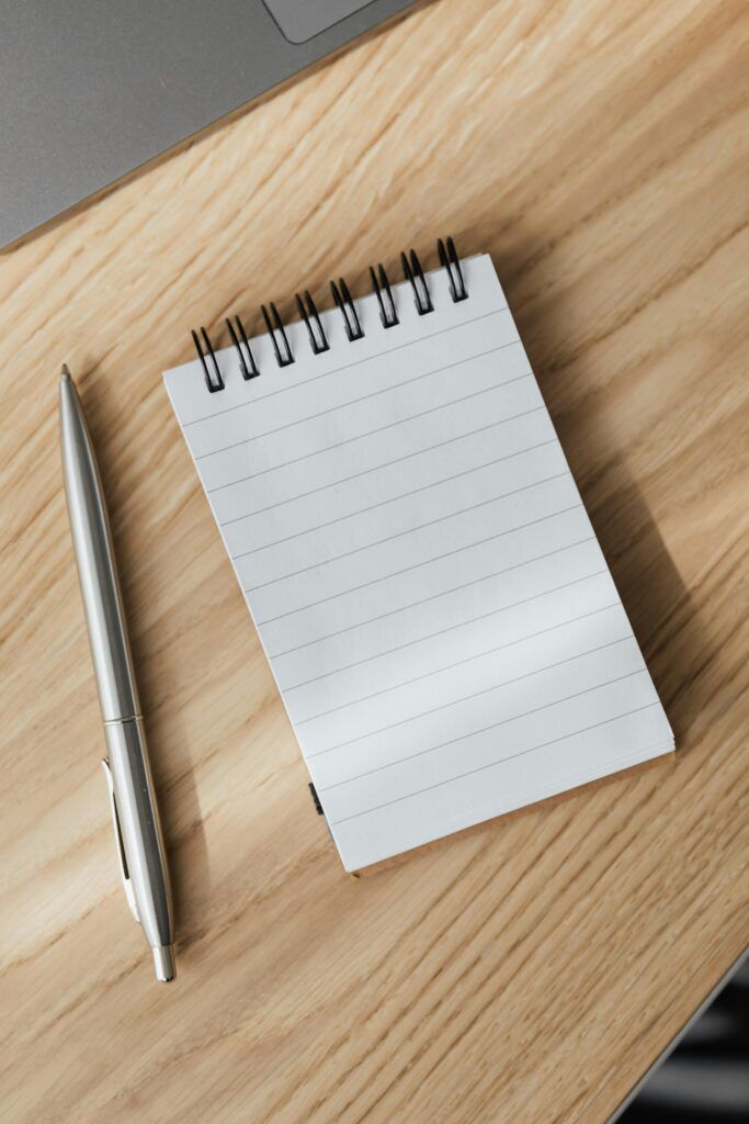 Notepad and pen.