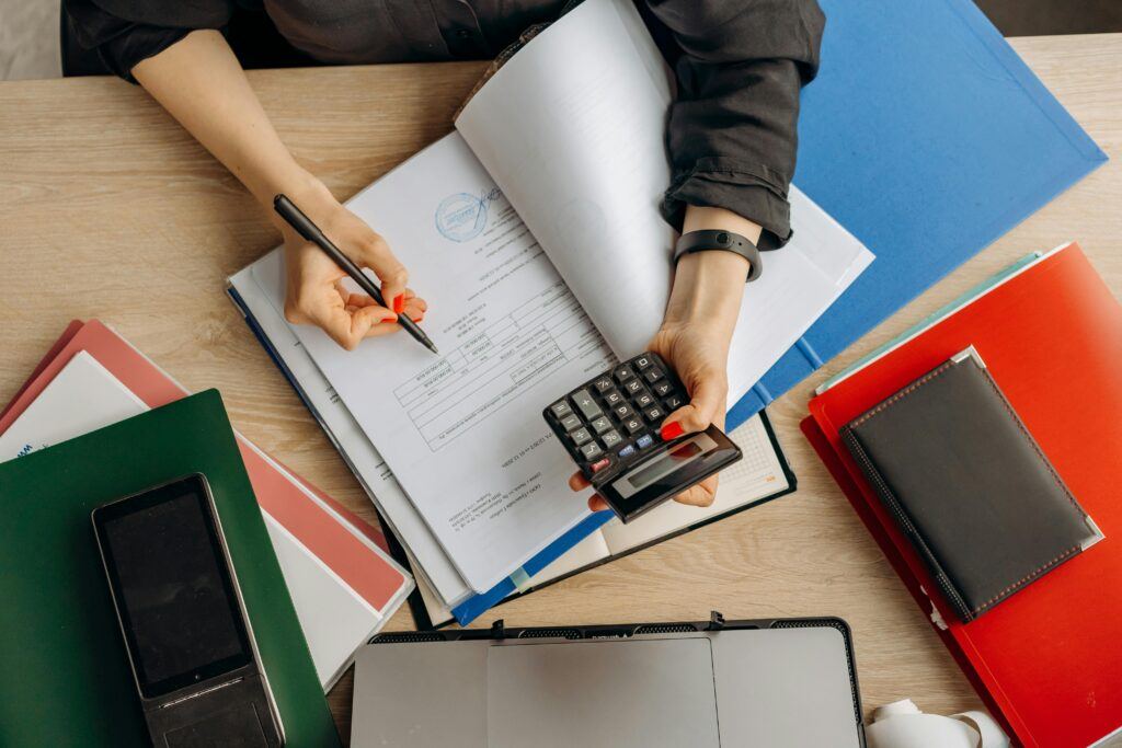 Person adding-up the numbers.